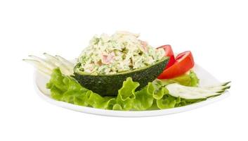 Crab meat salad with green caviar in avocado - japan cusine photo