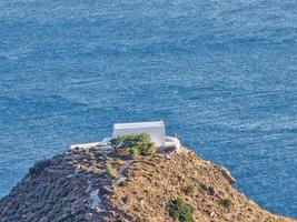 Church in Plaka village in Milos island photo