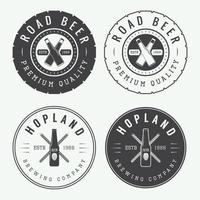 Set of vintage beer and pub logos, labels and emblems with bottles, hops, tires and wheat vector