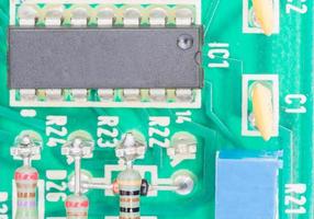 Condensers and Resistor assembly on the circuit board photo