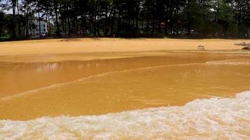 Naithon Beach bay turquoise clear water and waves Phuket Thailand. video