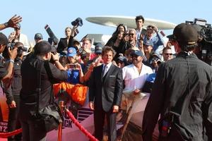 LOS ANGELES  MAY 4 - Tom Cruise, Press, Fans at the Top Gun - Maverick World Premiere at USS Midway on May 4, 2022 in San Diego, CA photo