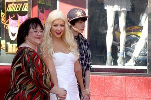 LOS ANGELES  NOV 15 - Mom Shelly Loraine Fidler, Christina Aguilera, brother Michael at the Hollywood Walk of Fame Star Ceremony for Christina Aguilera at Hard Rock Cafe Sidewalk, Hollywood and Highland on November 15, 2010 in Los Angeles, CA photo