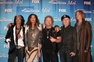 LOS ANGELES  MAY 23 - Aerosmith   L R  Musicians Joe Perry, Steven Tyler, Joey Kramer, Brad Whitford, and Tom Hamilton in the Press Room of the American Idol 2012 Finale at Nokia Theater on May 23, 2012 in Los Angeles, CA photo