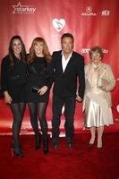 LOS ANGELES, FEB 8 - Jessica Springsteen, Patti Scialfa, Bruce Springsteen, Adele Springsteen arrives at the 2013 MusiCares Person Of The Year Gala Honoring Bruce Springsteen at the Los Angeles Convention Center on February 8, 2013 in Los Angeles, CA photo