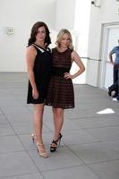 SAN DIEGO, JUL 22 - Eve Myles, Alexa Havins at the 2011 Comic-Con Convention, Day 2 at San Diego Convetion Center on July 22, 2010 in San DIego, CA photo