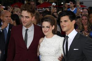 Robert Pattinson, Kristen Stewart, and Taylor Lautner
2010 Los Angeles Film Festival, Eclipse Premiere
Nokia Theatre L.A. Live
Hollywood, CA
June 24, 2010 photo