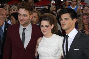 Robert Pattinson, Kristen Stewart, and Taylor Lautner
2010 Los Angeles Film Festival, Eclipse Premiere
Nokia Theatre L.A. Live
Hollywood, CA
June 24, 2010 photo