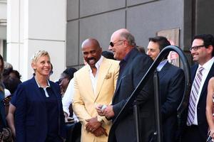 LOS ANGELES, MAY 13 - Ellen DeGeneres, Steve Harvey, Dr. Phil McGraw at the Steve Harvey Hollywood Walk of Fame Star Ceremony at the W Hollywood Hotel on May 13, 2013 in Los Angeles, CA photo