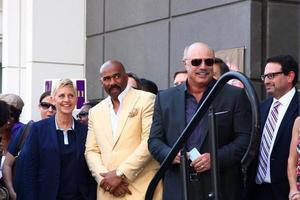 LOS ANGELES, MAY 13 - Ellen DeGeneres, Steve Harvey, Dr. Phil McGraw at the Steve Harvey Hollywood Walk of Fame Star Ceremony at the W Hollywood Hotel on May 13, 2013 in Los Angeles, CA photo