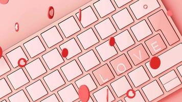 Keyboard in pink pastel color and the word LOVE spelled on it video