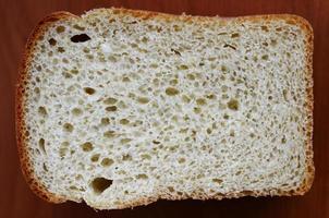 White bread texture in a cut. Close-up view on the plane of the finished dough product photo