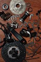 Many different metal parts and components of the running gear of a sports bike photo