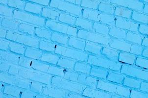 Square brick block wall background and texture. Painted in blue photo