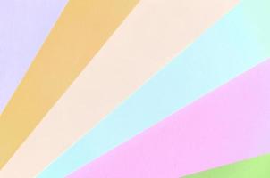 Texture background of fashion pastel colors. Pink, violet, orange, green, beige and blue geometric pattern papers photo