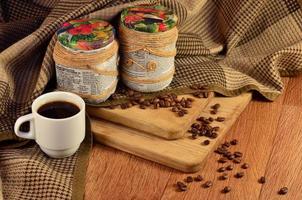 Still life with coffee cup and beans photo