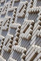 A pattern made of white bricks in the form of diamond shapes. Decoration of the walls during the Soviet Union photo