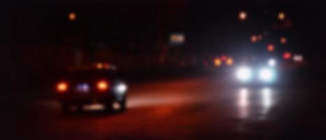 Blurred landscape of night city photo