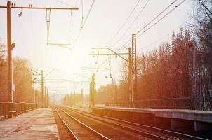 A railway station with platforms for waiting for trains photo