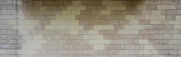 Rustic old beige white brick wall background photo