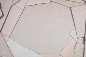 Background of paper textures piled ready to recycle. A pack of old office cardboard for recycling of waste paper. Pile of wastepaper photo