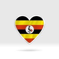 Heart from Uganda flag. Silver button heart and flag template. Easy editing and vector in groups. National flag vector illustration on white background.