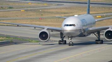 FRANKFURT AM MAIN, GERMANY JULY 19, 2017 - United Airlines Boeing 777 taxiing after landing on runway 25R. Fraport, Frankfurt, Germany video