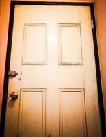 White old wooden door in close up. photo