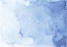 Watercolor azure blue gradient background texture, hand painted. Aquarelle ombre light royal blue backdrop, stains on paper. Artistic painting wallpaper. photo
