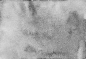 Watercolor calm gray background texture. Aquarelle monochrome stains on paper. photo