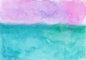 acuarela rosa pastel y textura de fondo verde mar. telón de fondo de acuarela. manchas sobre papel, pintadas a mano. foto