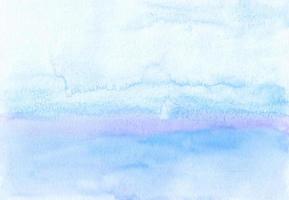 Watercolor pastel blue and purple ombre background texture, hand painted. Stains on paper. Artistic painting wallpaper. photo