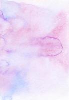 Watercolor pastel pink and purple gradient background texture, hand painted. Aquarelle light purple ombre backdrop, stains on paper. Artistic painting wallpaper. photo
