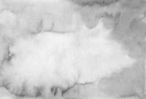 Abstract black and white watercolor background with copy space. Artistic grey backdrop, stains on paper. Aquarelle monochrome painting wallpaper. photo