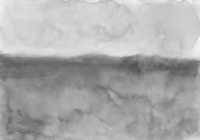 textura de fondo gris calma acuarela, pintada a mano. telón de fondo artístico en blanco y negro, manchas en papel. telón de fondo monocromático minimalista foto