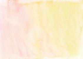 Watercolor pastel yellow and orange gradient background texture. Light peach stains on paper, hand painted. photo