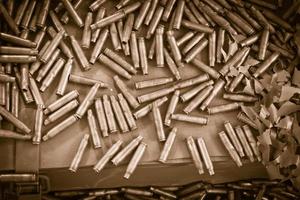 Pile of bullets background photo