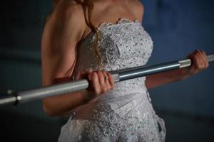 the bride in the gym. cross fit, healthy lifestyle photo