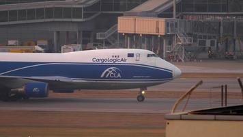 HONG KONG NOVEMBER 07, 2019 - CargoLogicAir Boeing 747 G CLAA taxiing after landing. Chek Lap Kok airport, Hong Kong video