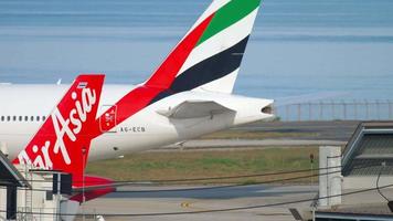 PHUKET, THAILAND DECEMBER 1, 2018 - Emirates Boeing 777 A6 ECB taxiing after landing at Phuket International airport video