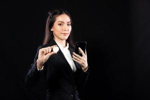 Business woman look at Bitcoin btc cryptocurrency as saving bank account currency in finance exchange trade for digital money gold technology cash. Person invest in electronic online payment market