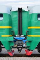 Transition between two electric trains. A small corridor in the role of a portal between the two sides of the cabin of a Russian electric train photo