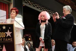 LOS ANGELES, APR 11 -  Sharon Osbourne, Cyndi Lauper, Harvey Fierstein at the Harvey Fierstein and Cyndi Lauper Hollywood Walk of Fame Ceremony at the Pantages Theater on April 11, 2016 in Los Angeles, CA photo