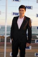 LOS ANGELES, AUG 5 -  Harry Shum Jr. arriving at the FOX TCA Summer 2011 Party at Gladstones on August 5, 2011 in Santa Monica, CA photo