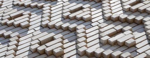 A pattern made of white bricks in the form of diamond shapes. Decoration of the walls during the Soviet Union photo