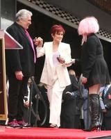 LOS ANGELES, APR 11 -  Harvey Fierstein, Sharon Osbourne, Cyndi Lauper at the Harvey Fierstein and Cyndi Lauper Hollywood Walk of Fame Ceremony at the Pantages Theater on April 11, 2016 in Los Angeles, CA photo