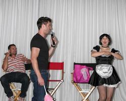 LOS ANGELES, AUG 27 -  Daniel Goddard with Singing Telegram Actress getting Birthday Greetings from Fans that hired her attending the Daniel Goddard Fan Event 2011 at the Universal Sheraton Hotel on August 27, 2011 in Los Angeles, CA photo