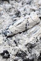 Pile of ashes after the fire went out grunge background texture photo
