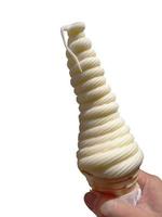 Cutout of a right hand holding tall twist shape soft cream in waffle cone, isolated, object, transparent, copy space with clipping path photo