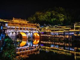 Scenery view in the night of fenghuang old town .phoenix ancient town or Fenghuang County is a county of Hunan Province, China photo